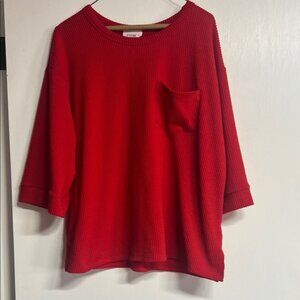 Andre by Unit Bright Red Women's Crew Neck Sweater. It is ribbed fabric.